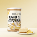 Bio Lemon Cheesecake Flavour Powder Dose von Organic Workout mit Zitronen-Cheesecake, cremefarbener Hintergrund
